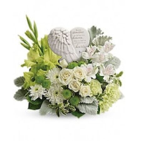 My Lady's Florist Westland - A heartfelt expression of your sympathy, this majestic mix of white roses will rejuvenate the spirit. Nestled among the blooms is a graceful angel's wing keepsake, etched with an encouraging message they'll cherish forever. Message on sculpt reads: \