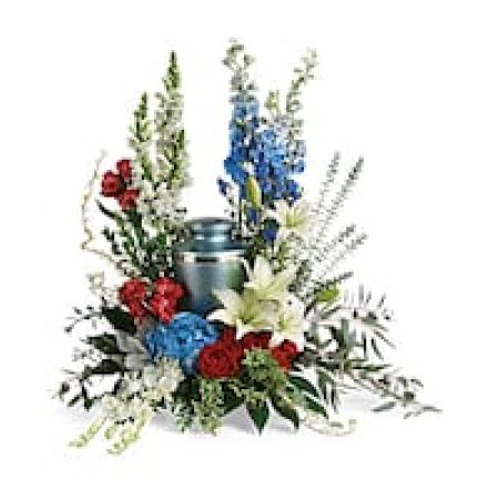 My Lady's Florist Westland - Proud and patriotic, this boldly designed red, white and blue bouquet displays the cremation urn with honor.\n