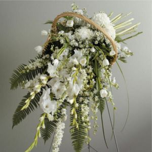 Wildflowers of Parkland Coral Springs - <p><span>A contemporary tribute, combining the warmth of a fireside basket with the drama of an easel display. Featuring gladiolus, larkspur, football mums, tulips and more.</span></p>