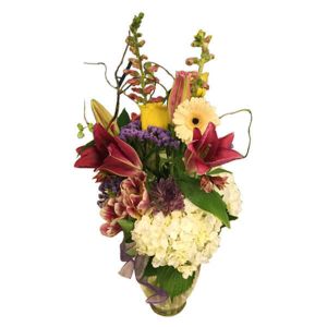 Wildflowers of Parkland Coral Springs - <p>Vased arrangement with various flowers that give a lively and cheerful effect</p>