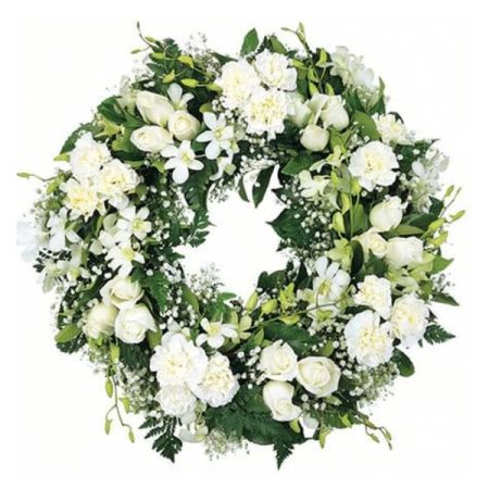 Wildflowers of Parkland Coral Springs - Introducing our "Whispers of Love" wreaths, thoughtfully designed and available in two sizes: 18" and 24". These charming wreaths feature a delicate blend of carnations, roses, baby's breath, dendrobiums, and lush greens, creating a heartwarming display of floral beauty. The 18" wreath is perfect for adding a touch of love to smaller spaces, while the fuller 24" wreath makes a beautiful and lasting impression. Ideal for various occasions, our "Whispers of Love" wreaths are a heartfelt way to express love, and sympathy, or celebrate special moments. With our same-day flower delivery, you can promptly order these lovely wreaths and convey your sentiments in a timely and meaningful manner.