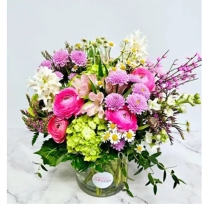 Floral Demo Shop Scottsdale - ## Pink

Let *Pink* whisper sweet nothings and brighten any space with its joyful exuberance. This isn’t just a bouquet; it’s a curated experience of delicate beauty, a burst of springtime bliss captured in a glass vase. Imagine the soft, romantic hues of ranunculus, fragrant stock, and playful spray roses dancing amongst the airy textures of daisies and verdant hydrangeas. 

Expertly designed with a focus on luxurious volume and unique color play, *Pink* is a modern masterpiece that feels both wild and refined. The varying shades of pink – from blush to vibrant fuchsia – create a captivating depth, while the touches of white and green provide a fresh, sophisticated contrast. 

Whether you’re celebrating a special occasion, expressing your love, or simply indulging in a moment of self-care, *Pink* delivers a feeling of pure happiness. Send a little sunshine to someone special or treat yourself to the instant mood-boosting power of fresh flowers. This stunning **pink flower arrangement** is perfect for birthdays, anniversaries, get well wishes, or just because. 

**Order your *Pink* bouquet today and let the beauty bloom!** Add to cart now and experience the magic. ✨ 

**Keywords:** pink flowers, flower delivery, flower arrangement, ranunculus, roses, hydrangeas, daisies, modern bouquet, birthday flowers, anniversary gift, get well flowers, send flowers, fresh flowers, luxury flowers, spring flowers.