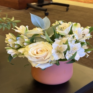 Dottie's Flowers and Plants Los Angeles - Bathed in soft hues, this elegant floral arrangement brings a touch of serene beauty to any space. Creamy roses, delicate lilies, and vibrant alstroemeria intertwine, creating a captivating fragrance and visual texture. Presented in a blush-toned ceramic vase, it’s a perfect expression of sympathy, gratitude, or simply “thinking of you.” Send this beautiful bouquet to brighten someone’s day with a classic gift of fresh flowers.