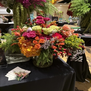 Dottie's Flowers and Plants Los Angeles - Indulge in the vibrant beauty of our "Autumn Radiance" floral arrangement, a stunning burst of color featuring rich roses, playful berries, and textured greenery. This luxurious bouquet evokes the warmth of fall with shades of deep burgundy, sunset orange, and lively chartreuse – a feast for the eyes and the soul. Perfect as a breathtaking centerpiece or a heartfelt gift to express love, gratitude, or simply brighten someone's day with fresh flowers. Send a touch of elegant joy with this unforgettable mixed flower bouquet, expertly designed for lasting freshness and impact.