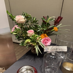Dottie's Flowers and Plants Los Angeles - This captivating floral design bursts with the romantic blush of roses and the rich, velvety tones of protea, creating a stunning centerpiece for any occasion. 
Emerald foliage and pops of vibrant marigolds add texture and a touch of wild beauty, evoking a sense of natural elegance.
Perfect for expressing love, gratitude, or simply brightening a space, this arrangement fills a room with both color and captivating fragrance.
Send a sophisticated statement with this unique bouquet – a truly unforgettable gift for birthdays, anniversaries, or just because.