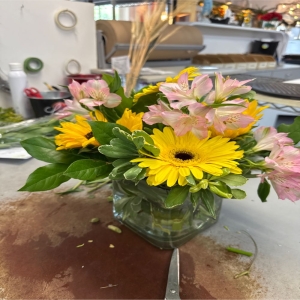 demo florist Fremont - Bathed in the warmth of a summer evening Solstice Radiance is a captivating floral arrangement designed to evoke pure joy and serenity. The blooms a harmonious blend of textures and tones seem to glow with an inner light. Imagine this centerpiece gracing your dining table adding a touch of sophisticated beauty to a special occasion or surprising a loved one with a gift that speaks volumes. Each stem is thoughtfully placed to create a flowing natural aesthetic – a reminder of sun-drenched days and peaceful moments. This arrangement is more than just flowers; it's a burst of sunshine to brighten any space and lift the spirit.