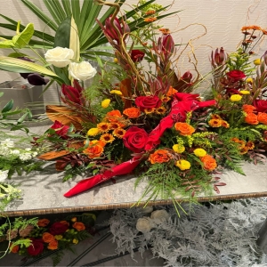 Madison Avenue Florist - Demo Fort Lauderdale - Bathe a room in the warmth of 'Sunstone Radiance' a captivating floral arrangement designed to evoke joy and serenity. Imagine this stunning bouquet gracing your dining table filling the space with a soft inviting glow.  The blend of textures and hues creates a sense of natural elegance perfect for celebrating life’s precious moments offering comfort or simply brightening someone’s day. The gentle curves of the blooms reminiscent of a summer sunset offer a visual embrace.  This is more than flowers; it's a feeling of sunshine captured in a vase.