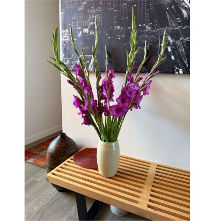 Beaverton Florists- Demo Beaverton - Commanding attention with their regal hue, these Purple Gladiolus stems bring a touch of sophisticated beauty to any space. 
Each bloom unfurls in layers of rich violet, exuding an air of grace and gentle fragrance, perfect for brightening a room or celebrating a special occasion.
Delivered in a classic vase, this striking arrangement makes a thoughtful gift to express admiration, sympathy, or simply ‘just because’.
Experience the enduring elegance of fresh gladiolus – a symbol of strength and integrity, now available for same-day flower delivery.
