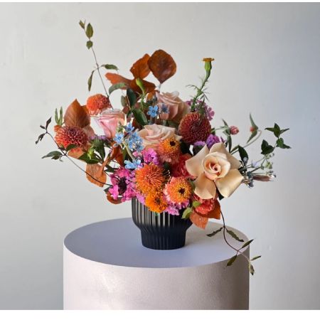 Beaverton Florists- Demo Beaverton - Bathed in the warm glow of a summer sunset Sunstone Radiance is more than just a bouquet; it's a feeling. Imagine the soft light streaming through a window illuminating the delicate petals of each bloom. This arrangement is a harmonious blend of textures and tones bringing a touch of sophisticated joy to any space.  The sweet fragrance hints at long leisurely days and cherished moments. Whether adorning your own table or sent as a thoughtful gesture Sunstone Radiance expresses warmth gratitude and genuine affection. This stunning centerpiece is perfect for birthdays anniversaries or simply to brighten someone’s day.