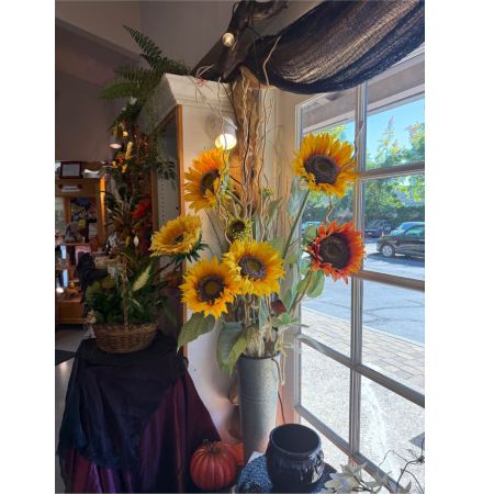 Beaverton Florists- Demo Beaverton - Bring the warmth and joy of a summer afternoon indoors with Sunlit Meadow. This stunning arrangement captures the essence of golden light spilling across a field of wildflowers. Delicate petals in shades of peach cream and butter yellow dance together creating a breathtaking display of natural beauty. Imagine this bouquet gracing your dining table brightening a loved one’s day or offering a comforting touch to a quiet moment. It's a thoughtful expression of happiness gratitude and lasting affection. The gentle curves and airy composition evoke a sense of peaceful serenity perfect for any occasion where a touch of sunshine is needed.