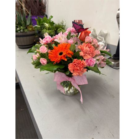 Beaverton Florists- Demo Beaverton - Bathed in the warm embrace of a late summer sunset Sunstone Radiance is more than just a bouquet; it's a feeling. Imagine the soft glow of these blossoms gracing your dining table bringing a touch of golden serenity to an intimate dinner or the joyous expression on a loved one's face as they receive this stunning display of affection.  Each stem is thoughtfully selected to evoke a sense of peaceful abundance creating a harmonious blend of texture and color. The gentle curves of the petals and the delicate fragrance promise a moment of quiet beauty perfect for celebrating life's simple pleasures or offering heartfelt sympathy. This arrangement is a vibrant expression of warmth gratitude and enduring love designed to illuminate any space and brighten any day.  It's a gift that speaks volumes without saying a word.