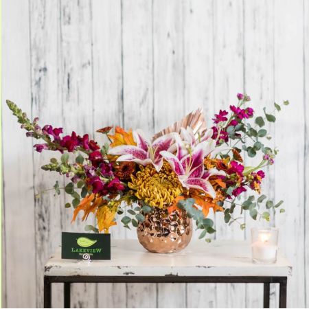 Beaverton Florists- Demo Beaverton - Bring a burst of sunshine and invigorating energy into any space with 'Ginger'. This dynamic arrangement isn’t just a bouquet; it's a feeling – a playful spark of joy a warm embrace a little bit of happy delivered.  Vibrant blooms cascade and playfully intertwine creating a textured masterpiece that feels both wild and refined. Imagine this arrangement gracing your dining table lifting the spirits of everyone around it or surprising a loved one with a gift that truly expresses your affection. The scent is light and fresh a subtle promise of brighter days. ‘Ginger’ is the perfect choice for celebrating life’s little victories offering comfort or simply brightening someone’s day. This stunning piece is expertly designed to last bringing weeks of natural beauty into your home.