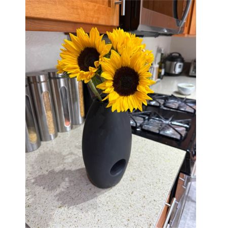 Beaverton Florists- Demo Beaverton - The ‘Delta’ arrangement is a captivating burst of color and texture designed to evoke feelings of warmth and joyful connection. Imagine a sun-drenched meadow translated into a stunning floral display. Soft velvety petals mingle with graceful arching stems creating a harmonious blend of natural beauty. This isn't just a bouquet; it's a moment of serenity brought to life – perfect for brightening a loved one’s day expressing heartfelt sympathy or simply indulging in the pleasure of having fresh flowers grace your home. The sweet delicate fragrance subtly perfumes the air adding a touch of elegance to any space. ‘Delta’ speaks volumes without saying a word offering comfort cheer and a reminder of the beauty that surrounds us. It’s a thoughtful gift for birthdays anniversaries or to show someone you're thinking of them.