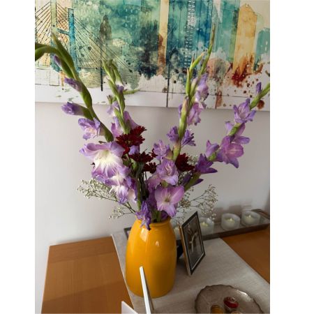 Beaverton Florists- Demo Beaverton - Introduce a burst of sophisticated joy with 'Elan' a captivating floral arrangement designed to express admiration and heartfelt appreciation. This stunning bouquet is a symphony of textures and hues radiating warmth and elegance. Imagine the soft blush of roses mingling with the delicate fragrance of lilies creating an inviting atmosphere in any space. The flowing lines and abundant blooms evoke a sense of graceful abundance perfect for brightening a loved one's day celebrating a special occasion or simply indulging in the beauty of nature. 'Elan' isn't just flowers; it's a moment of pure bliss beautifully presented and ready to convey your most cherished sentiments. Send a little luxury with 'Elan' – because some feelings deserve to be expressed with extraordinary beauty. This gorgeous arrangement is a delightful option for birthday flowers thank you gifts or a ‘just because’ surprise.