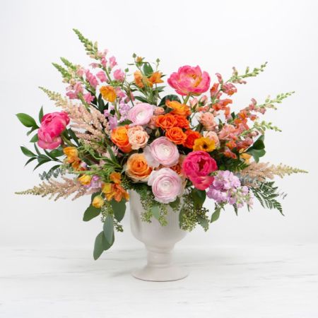 Beaverton Florists- Demo Beaverton - Pantone’s 2024 Color of the Year, “”Peach Fuzz”” is showcased in this luxurious and vibrant arrangement.

Our showstopper collection pieces are crafted to make a statement in both size and design.

Size: 24 x 16 x 23

STEMS INCLUDED:
Peonies| Ranunculus| Roses | Snapdragons| Astilbe | Spray Roses | Stock