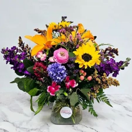 Beaverton Florists- Demo Beaverton - A vibrant dance of sunflowers, lilies, ranunculus, and hyacinth,
Delivered to your door, a burst of spring's brightness,
Golden petals, delicate blooms, layers of sunshine,
Each glance brings the promise of new beginnings.