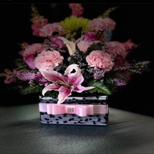 Almy's Florist San Bernardino - Capture a moment of radiant beauty with 'Stargazers' a breathtaking bouquet designed to evoke joy and wonder. Imagine the delicate fragrance filling a room the soft curves of the blooms reaching towards the light. This stunning arrangement features lush creamy white Stargazer lilies symbolizing admiration and sympathy intertwined with the vibrant warmth of peach roses and the playful elegance of pink alstroemeria.  Accents of verdant greenery provide a fresh natural foundation. ‘Stargazers’ is perfect for celebrating a special occasion offering comfort during challenging times or simply brightening someone’s day with a touch of pure floral delight.  Send a lasting impression with this captivating mix of texture and scent; it’s more than flowers it’s a feeling.