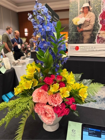 GotFlowers Demo Westland - Bursting with joy and vibrant life the ‘Rainbow r5’ arrangement is a stunning explosion of color designed to brighten any space and lift any spirit. Imagine the delicate fragrance drifting through the air as these fresh blooms unfurl bringing a touch of sunshine indoors. This captivating bouquet is a harmonious blend of textures and hues offering a feast for the eyes and a feeling of pure happiness. Perfect for celebrating life’s special moments – birthdays anniversaries or simply to show someone you care – the ‘Rainbow r5’ is a thoughtful and unforgettable gift.  It's a piece of art that speaks volumes without saying a word evoking warmth optimism and a sense of wonder.