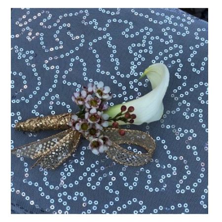 Flowers By Fairytales Elk Grove - Wax flower, one calla lily, and ribbon make up this boutonniere. Customers may choose the color of the ribbon.