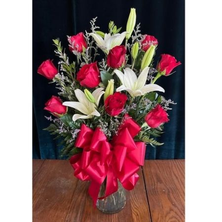 The Flower Box Kingsville - Want to make all the office ladies jelly this season? Try 12 stems of our lovely roses and lilies!