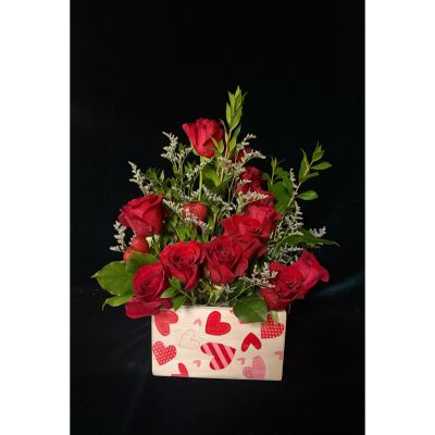 The Flower Box Kingsville - One dozen roses arranged in a valentine's themed rectangular box. Looking for valentine's arrangements? We've got it in The Box!