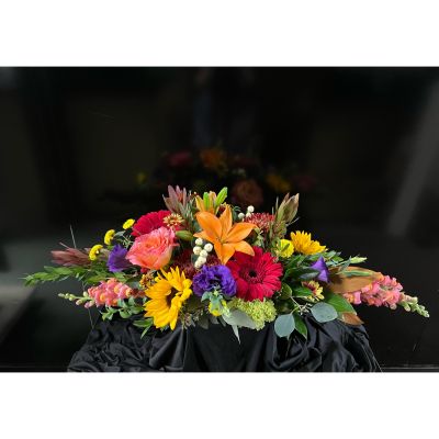 Fortin Gage Nashua - An abundance of blooms adorning your table! This long and low is featured in a gold metal container that we recommend using again for Christmas! Just bring it in and we’ll fill it to match your style.