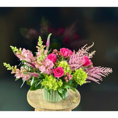 Fortin Gage Nashua - A vivid array of shades of pink. Delicate Veronica and whispering astilbe are giving this arrangement movement and whimsy. Premium roses and hydrangea bring the depth and brightness. Perfect for making a big scene. 