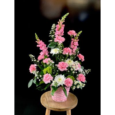 Fortin Gage Nashua - A light and bright one sided sympathy arrangement in pink and white flowers. The perfect mix of high end and long lasting stems. 