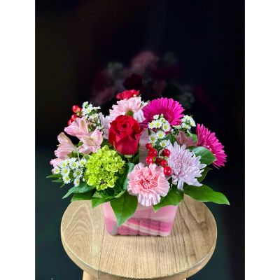 Fortin Gage Nashua - A berry basket filled with vibrant summer arrangement in bold pinks and reds! 