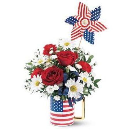 Madison Avenue Florist Sacramento -  Show your patriotic spirit, send this exciting red, white and blue bouquet, and let the fireworks begin. The roses, daisies and carnations, along with a whirling pinwheel, arrive in Spirit of America Mug.