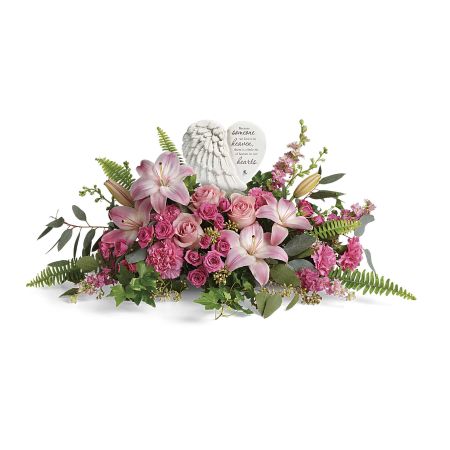 Flowers In Design Sacramento - The "Heartfelt Farewell Bouquet" is a poignant and beautiful tribute to celebrate the life of a special person. The bouquet features pink roses and lilies, conveying sentiments of love, admiration, and fond memories. Surrounding this arrangement is a porcelain keepsake, serving as a touching memento that holds deep sentimental value. This heartfelt gesture is a meaningful way to express sympathy and provide comfort to those grieving the loss of a loved one. The combination of flowers and keepsake creates a lasting tribute to honor and cherish the memories of the departed.