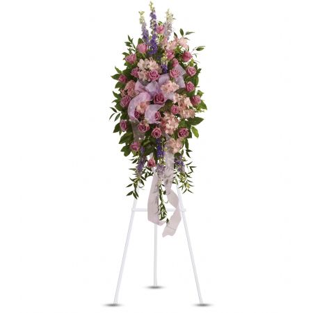Orangevale Florist Sacramento - The "Finest Farewell Spray" by Teleflora is a remarkably beautiful and feminine expression of love and farewell. Composed in soothing shades of lavender, this spray serves as a heartfelt tribute to a departed loved one, providing comfort and strength during a difficult time. Lavender flowers, known for their calming and healing qualities, are elegantly arranged to create a serene and dignified display. The spray is a symbol of everlasting love and remembrance, offering solace to those grieving the loss of someone special. Placed on an easel, the "Finest Farewell Spray" stands as a graceful and compassionate tribute to honor the memory of the departed soul.