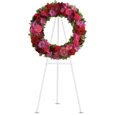 Orangevale Florist Sacramento - The Infinite Love wreath is a beautiful wreath that serves as a testament to the circle of life, acknowledging the continuity of existence even in moments of sadness. This thoughtful arrangement is designed to be appreciated by all those in attendance at a funeral or memorial service. The wreath symbolizes the everlasting nature of love and the enduring memories of a cherished life. Its elegant and heartfelt design conveys a message of comfort and support to those mourning the loss of a loved one. Displayed on a provided easel available in 3 wreath sizes





