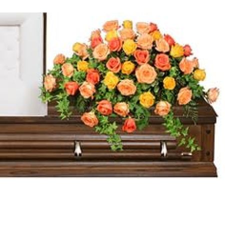 Flowers In Design Sacramento - Colorful casket spray of Coral Orange and yellow roses. Absolutely stunning! Shown as an open lid casket for viewing your loved one. Available in full closed lid style as well