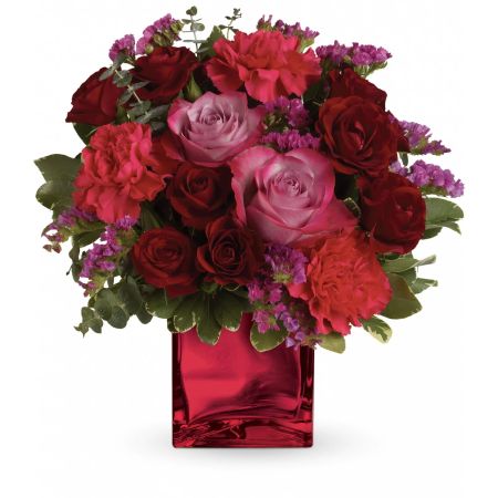 Madison Avenue Florist Sacramento - Enrapture someone you care about with this dramatic display of red and lavender roses with long lasting carnations and fill flowers that dramatically brightens any space. . 