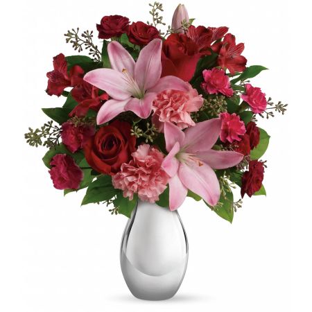 Madison Avenue Florist Sacramento - Express your love with the romantic a Moonlight Kiss Bouquet. This gorgeous arrangement features a stunning array of roses, lilies, and more, artistically arranged in a dazzling silver reflections vase. The combination of elegant blooms and a stylish vase creates a sophisticated and enchanting bouquet. As your special someone admires the beauty of this arrangement, they will undoubtedly feel the love and appreciation. With our same-day flower delivery, you can effortlessly send the Moonlight Kiss Bouquet to convey your heartfelt emotions promptly. It's a perfect choice for expressing love on special occasions or simply showing someone how much they mean to you.





