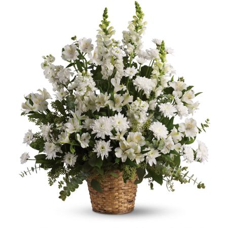 Madison Avenue Florist Sacramento - White alstroemeria, snapdragons and stock in a beautiful basket is a gift of caring that brings an air of serenity to the memorial service. Later, it will be a comfort for the family at home.