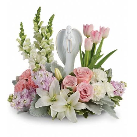 Flowers In Design Sacramento - Show them you care with this gorgeous display of roses, lilies and tulips, gracefully surrounding a timeless angel sculpture keepsake. Beautifully fragrant, it's a hopeful tribute that will warm their hearts forever.