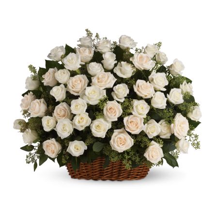 Madison Avenue Florist Sacramento - A beautiful, bountiful basket of luminous white roses that feels so fresh, natural, and welcomed in a home or at a service.