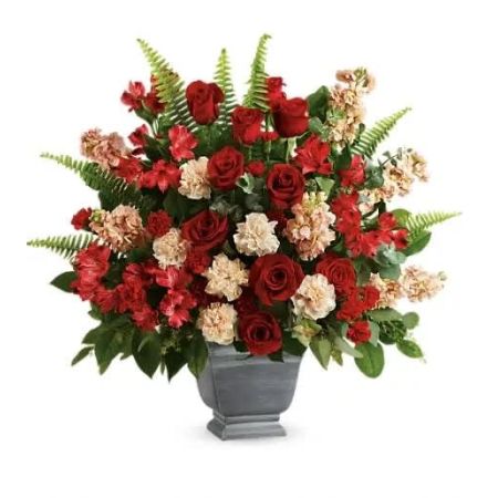 Orangevale Florist Sacramento - A bold expression of your deepest condolences, this elegant mix of red and peach blooms in a large antiqued pot brings strength and comfort.