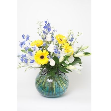 Conroy's Florist & Flower Delivery Mission Viejo - An array of bright yellow gerber daisies, white hydrangeas, white roses, fragrant white oriental lilies and blue belladonna delphiniums arranged in a hand blown Art Glass multi color vase.\tCONROY'S CUSTOM DESIGN BY YANG, WILL CALL OR LOCAL DELIVERY ONLY
