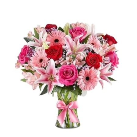Conroy's Florist & Flower Delivery Mission Viejo - Inspired by the rich beauty of the European countryside, our romantic bouquet reveals all the feelings you have in your heart. Fresh-picked pink & red blooms are on display inside a glass vase finished with ribbon, creating a timeless gift for someone you love.

All-around arrangement with red and hot pink roses, pink Stargazer lilies, Gerbera daisies, Peruvian lilies (alstroemeria) and limonium; accented with assorted greenery
Artistically designed in a clear glass vase accented with a pink satin ribbon; measures 8"H
Extra-large arrangement measures approximately 22"H x 15"W
Large arrangement measures approximately 18"H x 14"W
Medium arrangement measures approximately 17"H x 12"W
Small arrangement measures approximately 16"H X 10"W
Our florists hand-design each arrangement, so colors and varieties may vary due to local availability
To ensure lasting beauty, Stargazer lilies and Peruvian lilies may arrive in bud form and will fully bloom over the next few days
