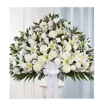 Conroy's Florist & Flower Delivery Mission Viejo - Symbolizing peace, serenity and purity, white flowers can help comfort those grieving the loss of someone they loved dearly. Our majestic standing basket arrangement in angelic white is an impressive tribute to their memory. Artistically designed by expert florists with an abundance of pristine white blooms, it is a heartfelt expression of your deepest sympathies.