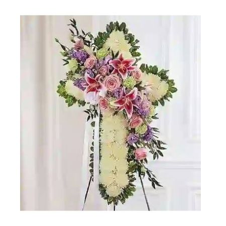 Conroy's Florist & Flower Delivery Mission Viejo - Express your faith, love and compassion in honor of a loved one with our beautiful standing cross arrangement. Our expert florists handcraft each of these impressive displays with a bed of white mums in the shape of a cross, and accent with a cascade of soft pastel blooms. It is a beautiful way to offer peace and comfort during a difficult time.

Standing cross arrangement of white football mums; pink roses, stargazer lilies and lisianthus; lavender lisianthus and stock; lime green carnations; accented with soft, lush greenery
Arrangement measures approximately 40&#34;H x 28&#34;L
Appropriate for the funeral home
Our florists use only the freshest flowers available, so colors and varieties may vary