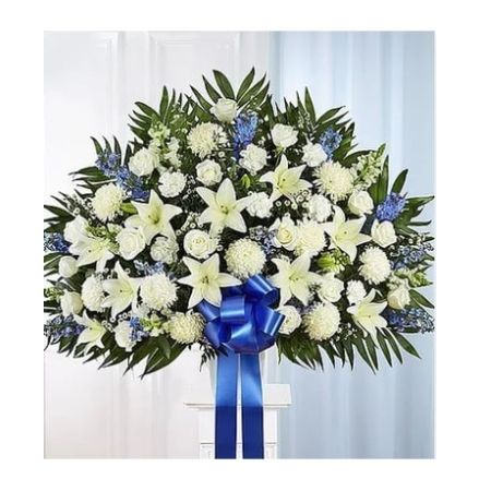 Conroy's Florist & Flower Delivery Mission Viejo - Maybe they loved the color blue…or maybe they enjoyed the calmness of the ocean under a cloudless sky. Our majestic blue and white standing basket arrangement will help honor their memory in a unique and meaningful way. Artistically designed by our expert florists with rich blue and pristine white blooms, this floral tribute is a heartfelt expression of your deepest sympathies.