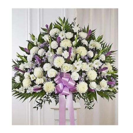 Conroy's Florist & Flower Delivery Mission Viejo - One who has touched the lives of many deserves to be honored in a uniquely touching way. Our majestic standing basket arrangement in lavender and white is an impressive tribute to their memory. Artistically designed by expert florists with an abundance of soft, lavender-hued and white blooms, it is a heartfelt expression of your deepest sympathies.
