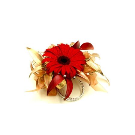 Conroy's Florist & Flower Delivery Mission Viejo - The Gerber Daisy Wrist Corsage is a vibrant and eye-catching floral accessory that brings a cheerful and playful touch to any special occasion. Gerber daisies are known for their large, colorful blooms and are popular for their bright hues and lively appearance.

This wrist corsage typically features one or more Gerber daisy blooms, showcasing their signature petals in various shades such as pink, orange, yellow, red, or white. The daisies are carefully arranged and may be accompanied by complementary accent flowers or greenery to enhance the overall design and provide a cohesive and balanced look.

The 2 lines rhinestone wristband ensures a comfortable fit, allowing the wearer to showcase the lively and spirited Gerber daisies throughout the event. The playful and vibrant colors of the daisies make this wrist corsage ideal for events such as weddings, proms, birthdays, and other celebrations.

The Gerber Daisy Wrist Corsage is a symbol of joy, happiness, and youthful exuberance, making it a delightful accessory to brighten up any outfit and create a memorable and lively impression on any special day.