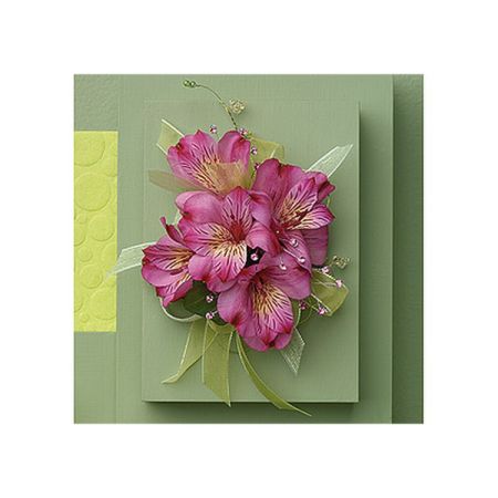 Conroy's Florist & Flower Delivery Mission Viejo - The wrist corsage features carefully selected Alstroemeria blooms, showcasing their beautiful and colorful petals. The Alstroemeria blooms are artfully arranged to create an elegant and eye-catching focal point. The color palette can range from soft pastels to vibrant hues, allowing for a wide range of options to complement different outfits and themes. The adjustable wristband ensures a comfortable fit, allowing the wearer to display the beauty of the Alstroemeria flowers.