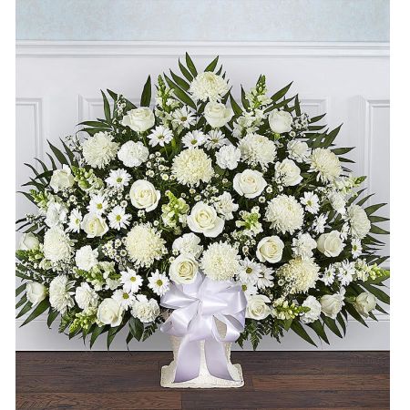 Conroy's Florist & Flower Delivery Mission Viejo - There’s a feeling of peace and tranquility that white flowers can bring to those who are grieving. Our elegant all-white floor basket, handcrafted by our caring florists with lush white blooms, is a tasteful gesture perfectly suited for the funeral home or memorial services.<br/><br/>