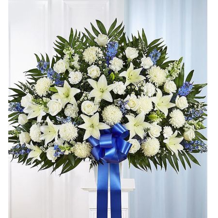 Conroy's Florist & Flower Delivery Mission Viejo - Maybe they loved the color blue…or maybe they enjoyed the calmness of the ocean under a cloudless sky. Our majestic blue and white standing basket arrangement will help honor their memory in a unique and meaningful way. Artistically designed by our expert florists with rich blue and pristine white blooms, this floral tribute is a heartfelt expression of your deepest sympathies.<br/><br/>